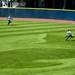 Michigan junior Lyndsay Doyle runs to catch a ball in the game against Louisiana-Lafayette on Friday, May 24. Daniel Brenner I AnnArbor.com